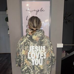Camouflage Hoodie with 'Jesus Loves You' Print